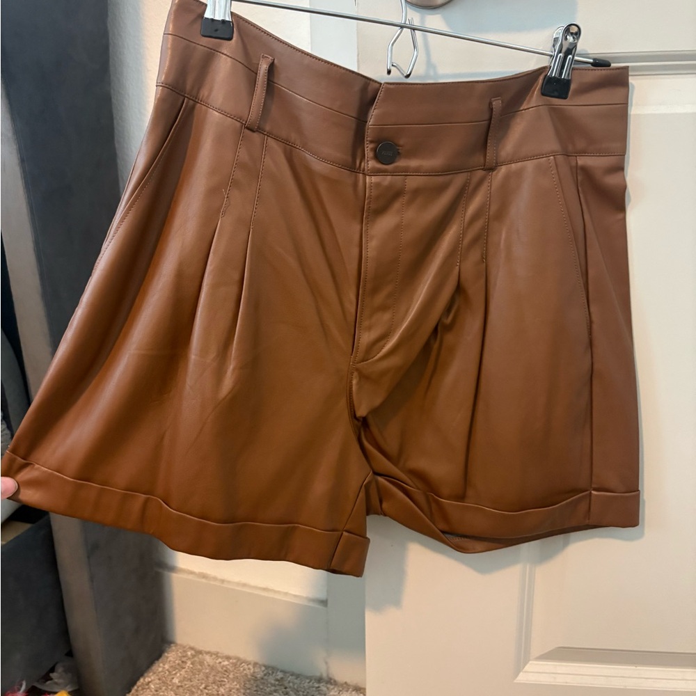 PAIGE Faux Leather Pleated Bermuda Shorts in Cognac Brown
